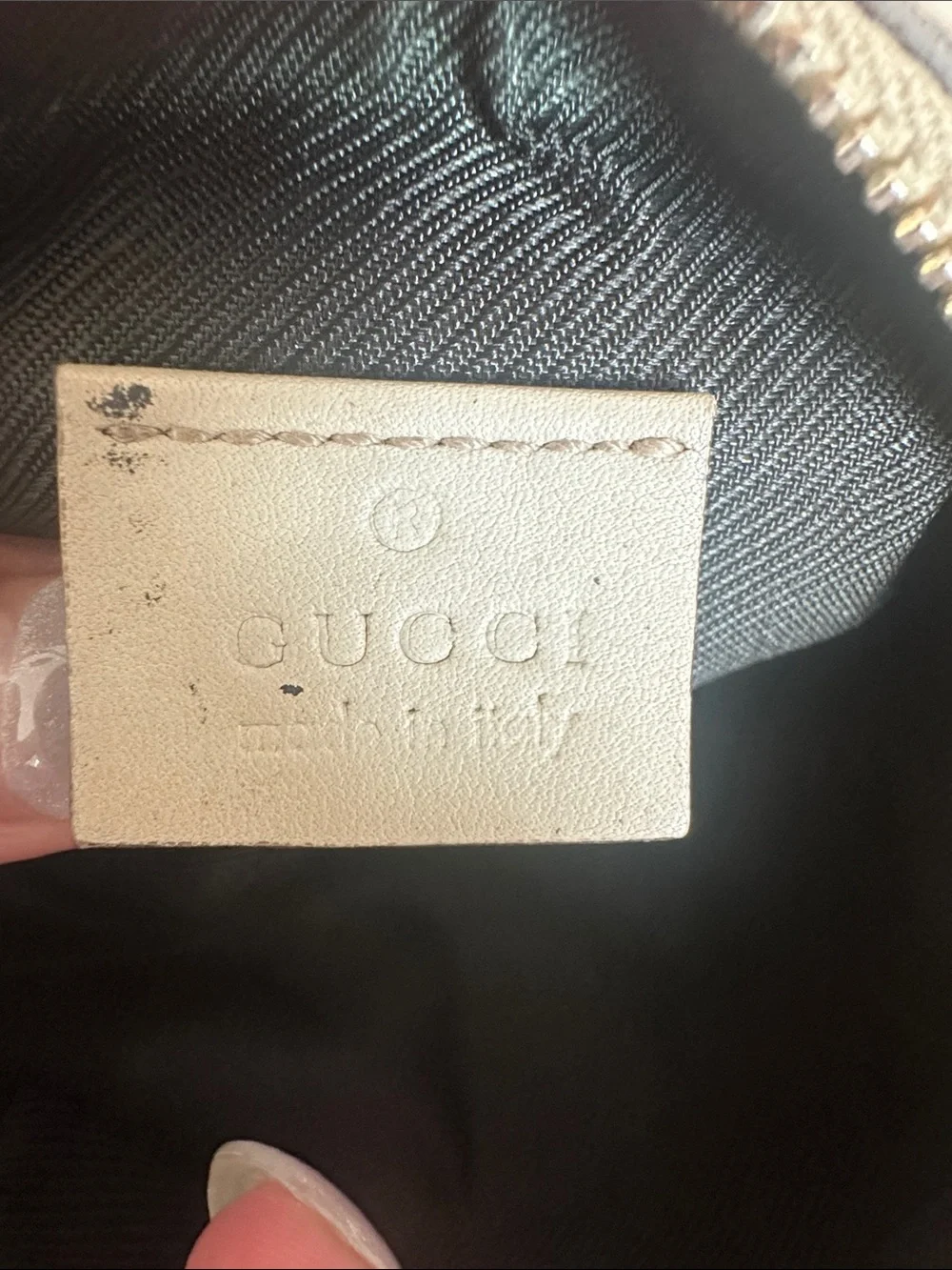 Gucci Embossed GG Leather Pouch